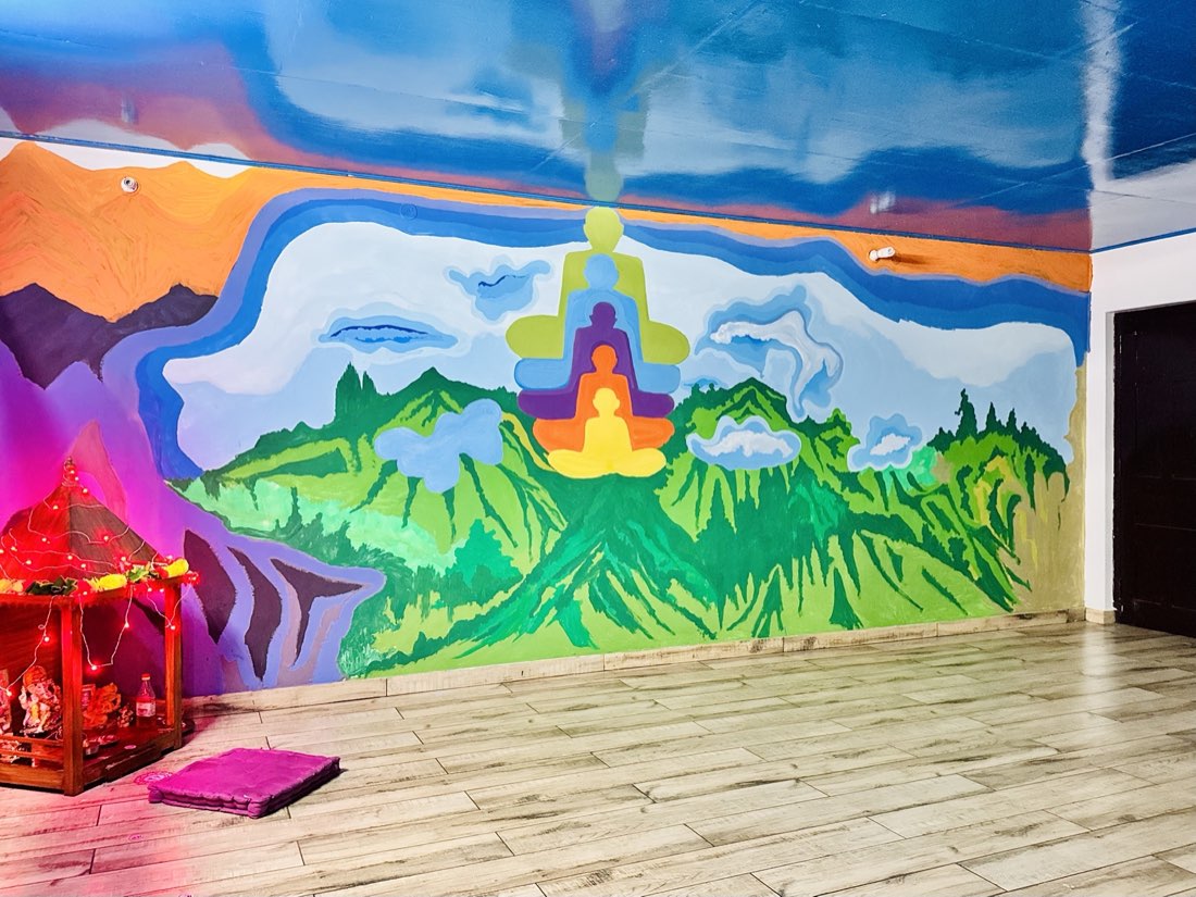 Meditation mural with Panchachuli peaks and puja shrine