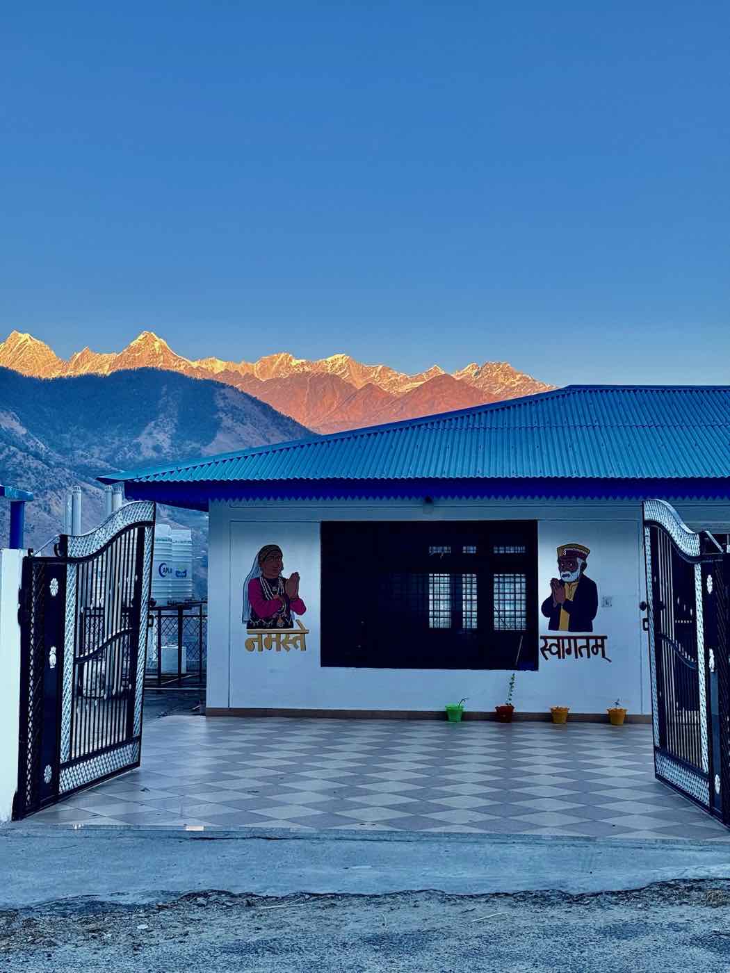 SamathaStay at sunset with the Panchachuli range glowing behind it